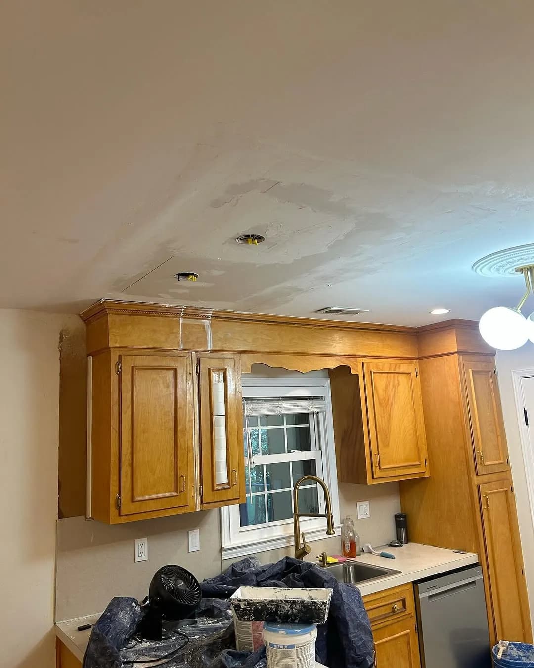 Ceiling patched and mudded with new recessed light openings